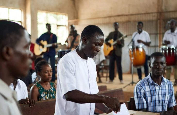 Why I stopped paying tithe after relocating to UK – Nigerian prison officer