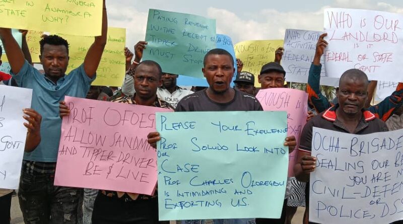 Tension in Onitsha as sand miners, tipper drivers protest alleged extortions by OCHA Brigade