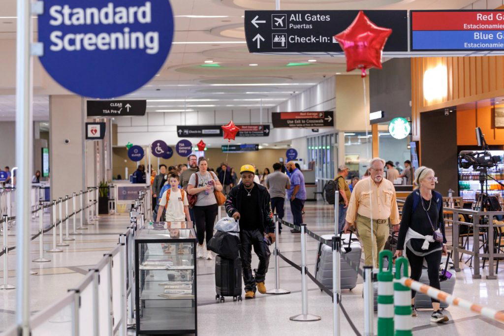 Airport workers miss pay as US govt shutdown hits one month