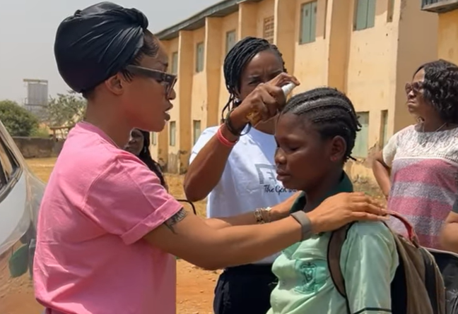 Video: Tonto Dikeh holds deliverance prayer for schoolgirl during evangelism outreach