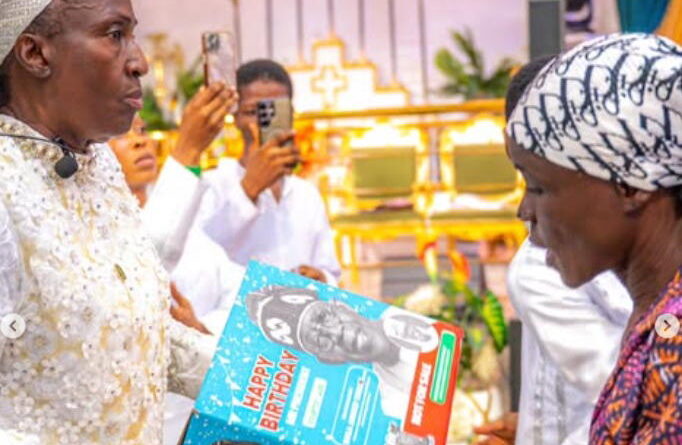 Video: Rev Esther Ajayi shares Tinubu-branded Easter packages in church