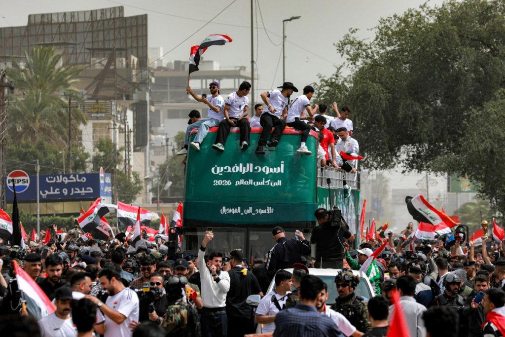 Thousands welcome Iraq football team home after World Cup qualifier