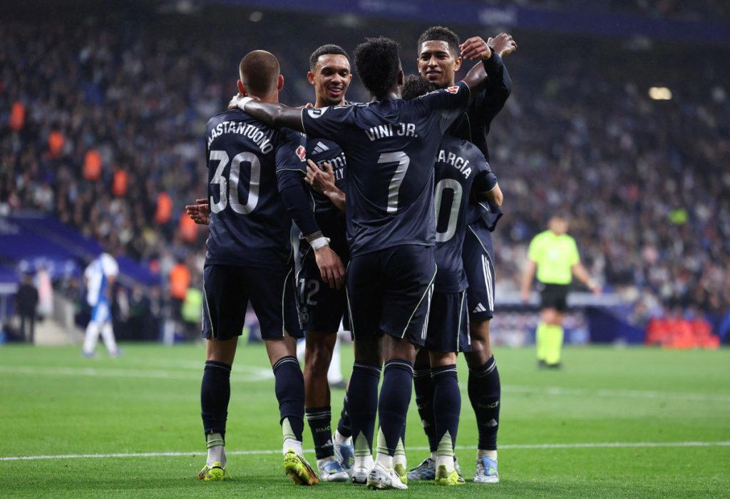 Vinicius brace delays Barca title as Real Madrid down Espanyol