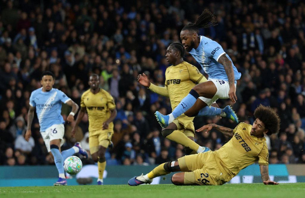 Man City see off Crystal Palace to keep pressure on Arsenal