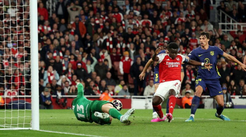 Saka strikes Arsenal into Champions League final