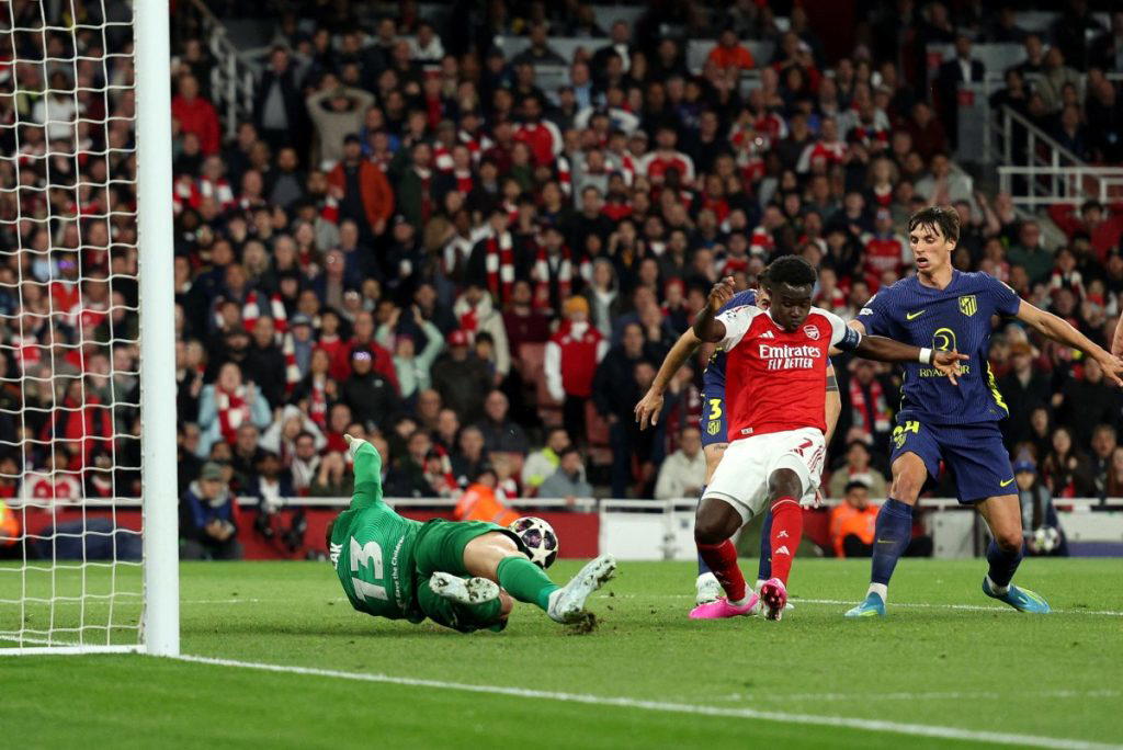 Saka strikes Arsenal into Champions League final