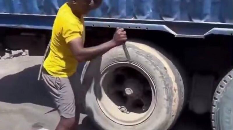 Video: Man escapes death after attempts to burst truck tyre
