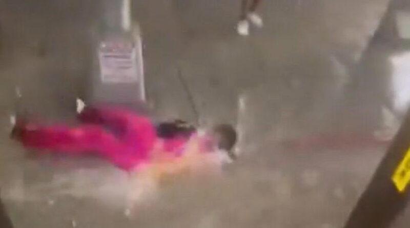Video: Woman swept away as flash floods paralyse New York City