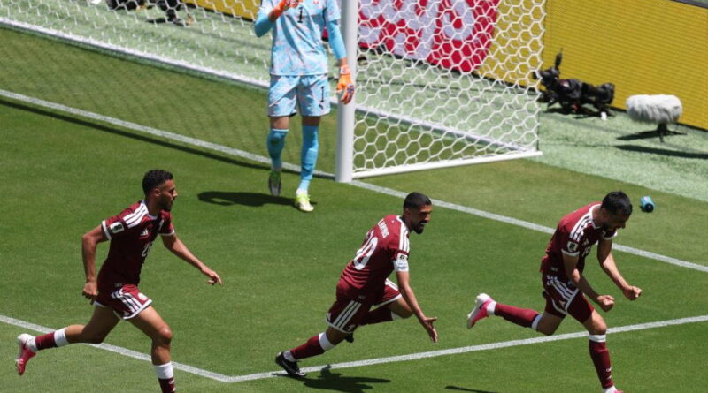 Qatar earn first ever World Cup point with late goal