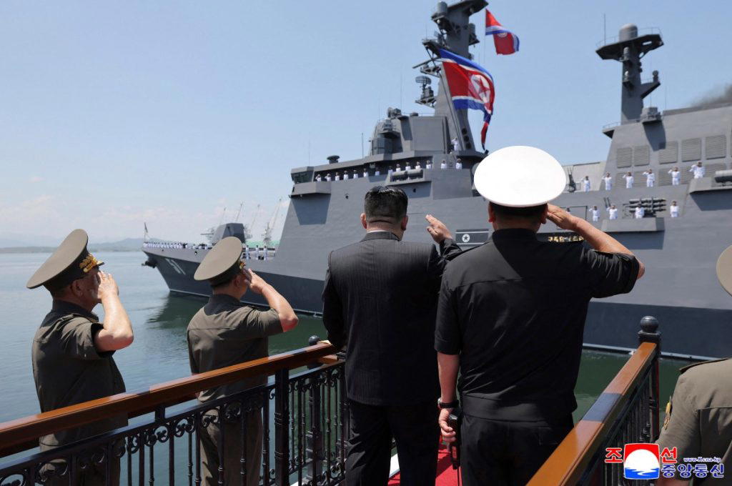 North Korea’s Kim unveils plans for 10,000-ton warships, nuclear navy
