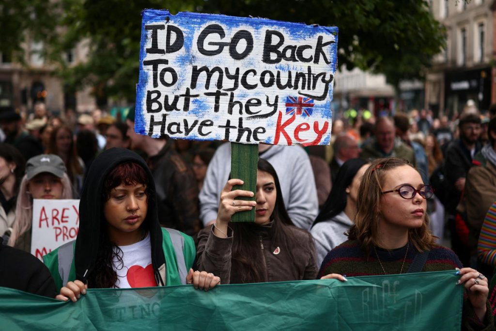Thousands turn out for anti-racism rally after Belfast unrest