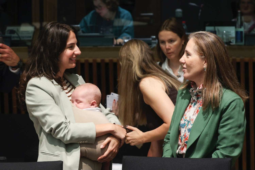 Sweden’s minister attends EU meeting with three-month-old son