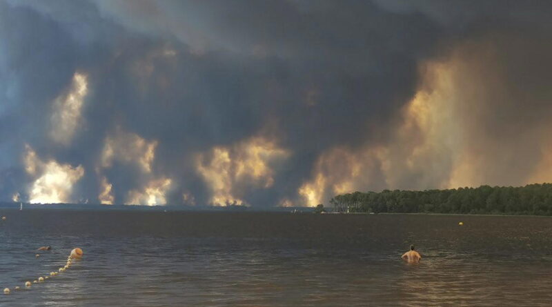 More than 160,000 flee out-of-control wildfires in France, Spain