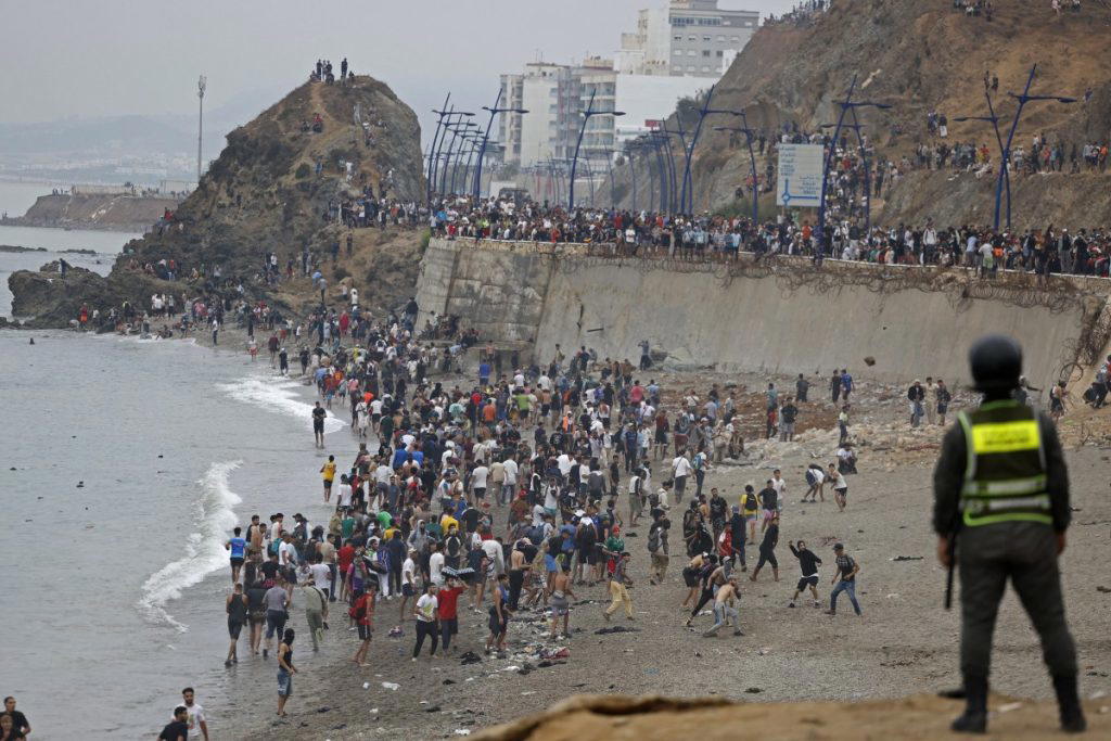 Thousands cross from Morocco into Spain in new migrant crisis