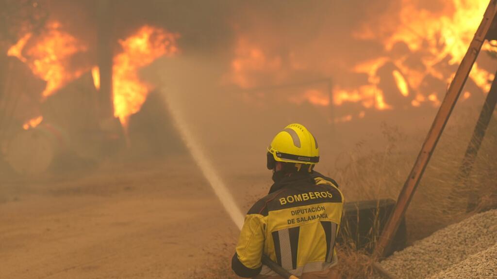 Untamed wildfires in Spain, France force over 200,000 to flee