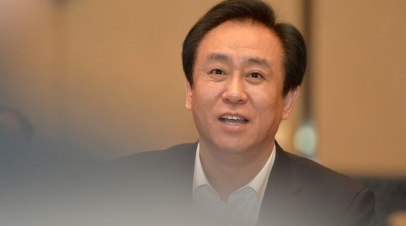 China jails Evergrande founder for life, fines firm over $2bn