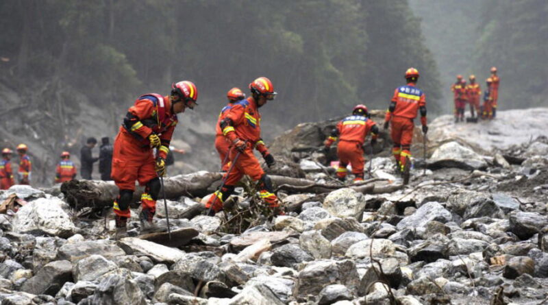 Rescuers dig into tunnel as missing toll from Nepal, China flood over 3,000