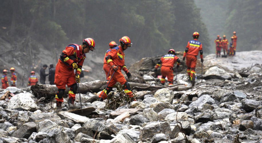 Rescuers dig into tunnel as missing toll from Nepal, China flood over 3,000