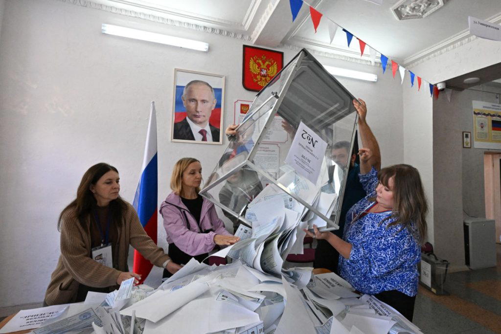 Putin’s United Russia party wins record 355 parliament seats