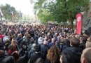 Protests banned in parts of Paris as Macron swipes at Trump