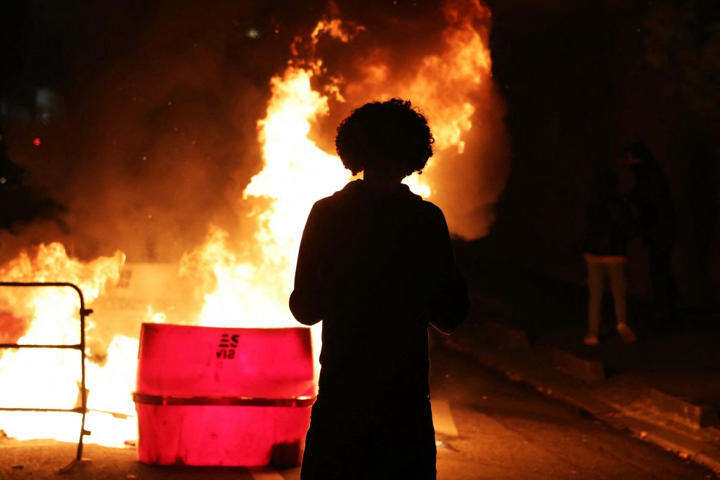 Clashes break out as hundreds of thousands protest in France